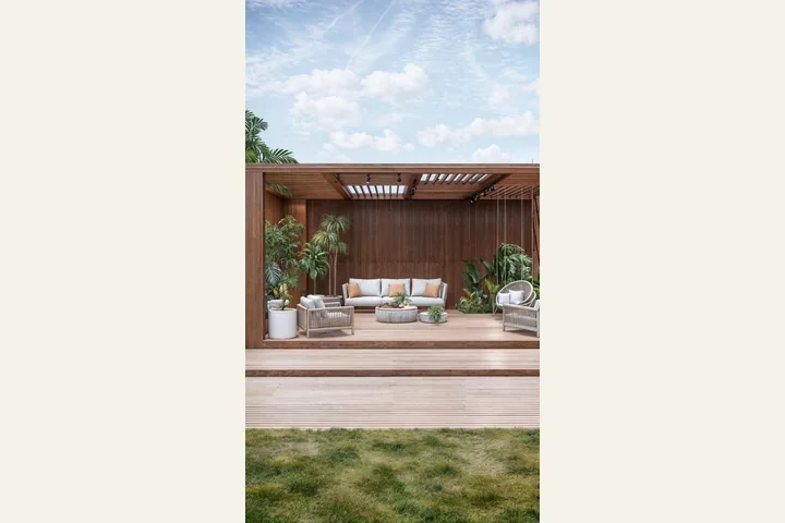 Vista do jardim para o pergolado com deck e área de convivência